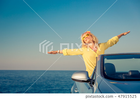 Happy woman travel by car 47915525