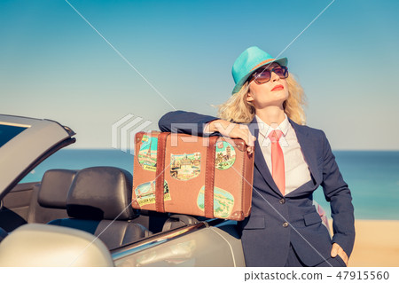 Successful young businesswoman on a beach 47915560