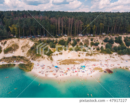 aerial view of lake shore in sunny day. aerial view of lake shore in sunny day. 47917227