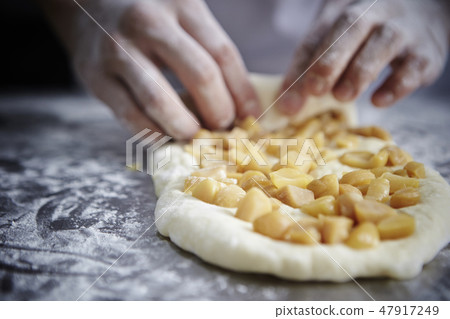 Men making bread Men making bread 47917249