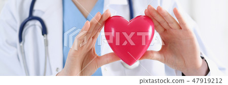 Female medicine doctor hands holding and covering 47919212