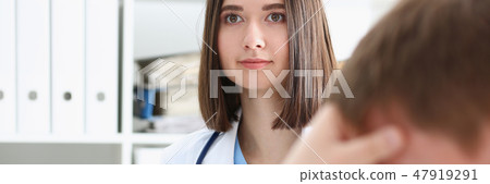 Friendly female doctor hold patient shoulder Friendly female doctor hold patient shoulder 47919291