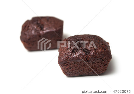closeup of mini brownies on white background 47920075