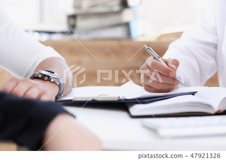 Concerned handsome doctor communicate Concerned handsome doctor communicate 47921326
