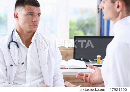 Handsome male medicine doctor with Handsome male medicine doctor with 47921500