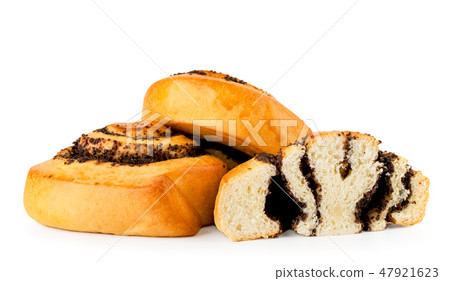 Two buns with poppy seeds and half on a white Two buns with poppy seeds and half on a white 47921623