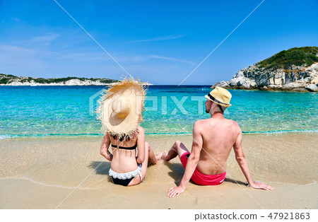 Couple on beach in Greece 47921863