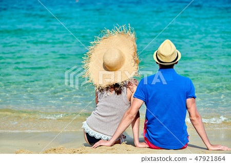 Couple on beach in Greece 47921864