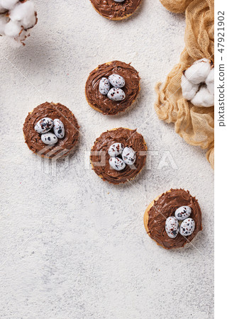 Easter cookies in shape of nest with eggs Easter cookies in shape of nest with eggs 47921902