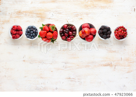 Mixed berries in bowls Mixed berries in bowls 47923066