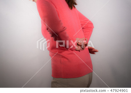 Senior female low back pain Senior female low back pain 47924901