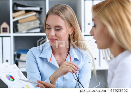 Beautiful woman portrait at workplace Beautiful woman portrait at workplace 47925402