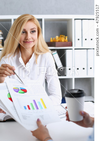 Beautiful smiling businesswoman portrait at workplace Beautiful smiling businesswoman portrait at workplace 47925517