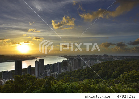 Freshwater estuary city buildings with clouds at dusk 47927282