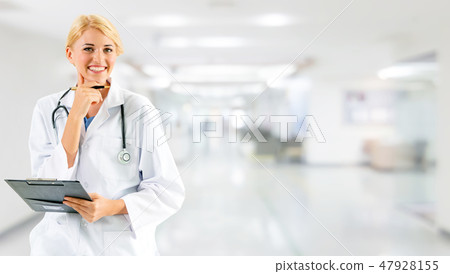 Woman doctor working at the hospital office. Woman doctor working at the hospital office. 47928155