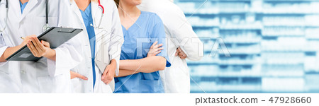 Doctor working in hospital with other doctors. 47928660