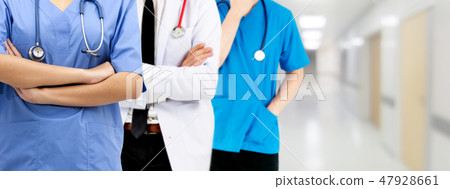 Doctor working in hospital with other doctors. 47928661