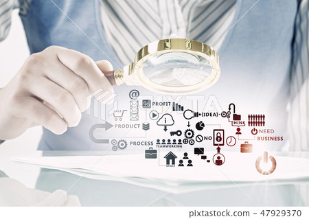 Businessperson examining business plan 47929370