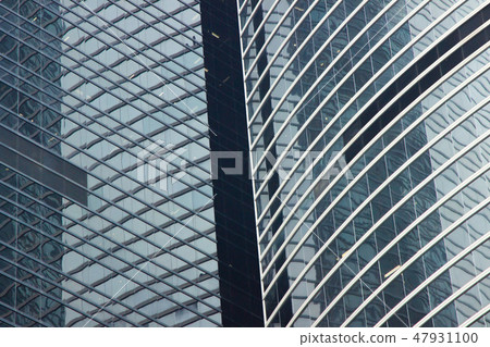 Glass facade business skyscrapers in city architecture. Glass window background. Business building Glass facade business skyscrapers in city architecture. Glass window background. Business building 47931100