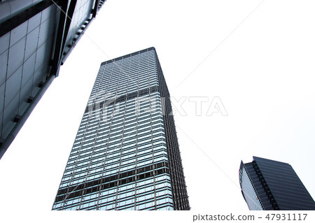 Glass facade business building bottom view in Hong Kong city. Office building and skyscrapers facade 47931117