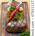 Barbecue meat steak composition. Grilled steak with red hot pepper, herb, corn and tomato sauce on 47931127