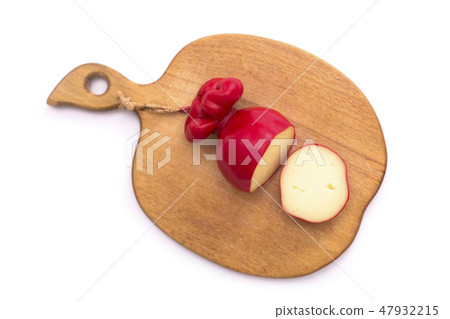 Handmade smoked hard cheese in paraffin shells 47932215