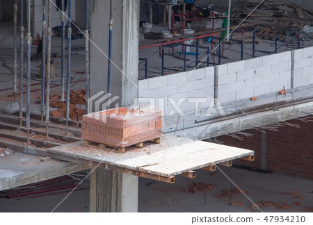 brick in work construction in building high site  47934210