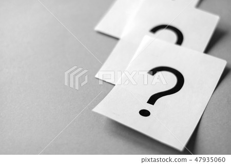 White cards with printed question marks White cards with printed question marks 47935060