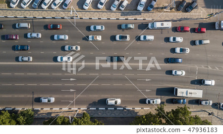 Aerial Drone Flight top down View of freeway busy city rush hour heavy traffic jam highway. 47936183