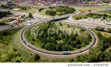 Aerial view roundabout interchange of a city, Expressway is an important infrastructure. 47936798