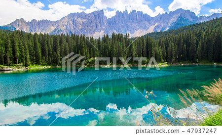 The Karersee, a lake in the Italian Dolomites 47937247