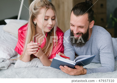 family morning vacation planning man woman notes family morning vacation planning man woman notes 47937310