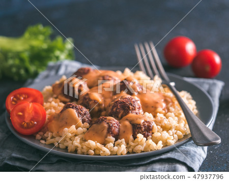 Bulgur and meatball in plate Bulgur and meatball in plate 47937796