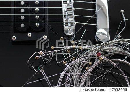 Chord exchange of worn-out electric guitar 47938566