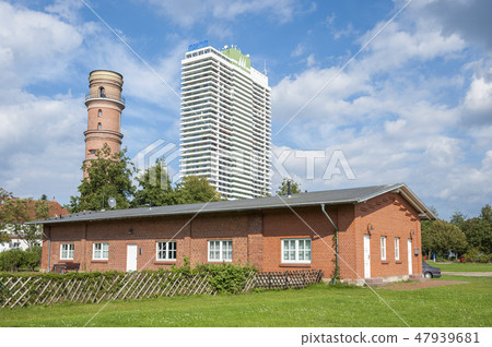 Old Lighthouse and Hotel Maritim in Travemuende 47939681