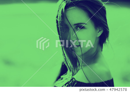 duotone Girl portrait duotone close-up portrait view of the camera 47942578