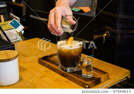 Cold brew coffee with soda and lemon 47944613