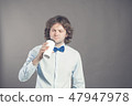 Close up portrait of happy handsome man in blue shirt with paper cup of morning coffee. Good morning 47947978