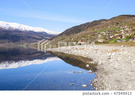 Tranquil lakeside scenery of Voss in Norwegian small town 47949913