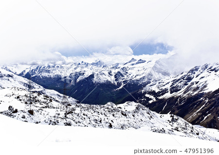 Caucasus mountains under fluffy snow 47951396