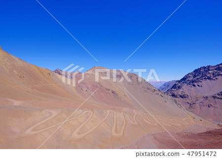 Old dangerous mountain road of the Paso de la Cumbre or Cristo Redentor in the Andes between Old dangerous mountain road of the Paso de la Cumbre or Cristo Redentor in the Andes between 47951472