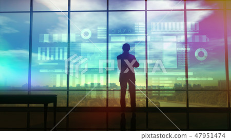 Silhouette of a trader in the office before infographics Silhouette of a trader in the office before infographics 47951474