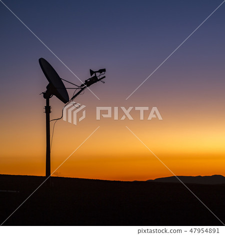Satellite and golden horizon at sunset California Satellite and golden horizon at sunset California 47954891