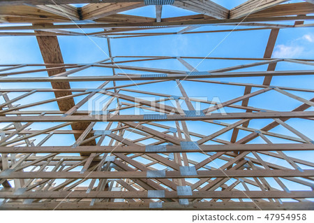 Roof beams of a new wooden construction 47954958
