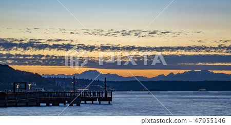 Pier in Tacoma bay against a dramatic sunset 47955146