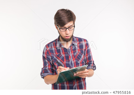 People, business and student concept - surprised young man writing on clipboard on white background People, business and student concept - surprised young man writing on clipboard on white background 47955816