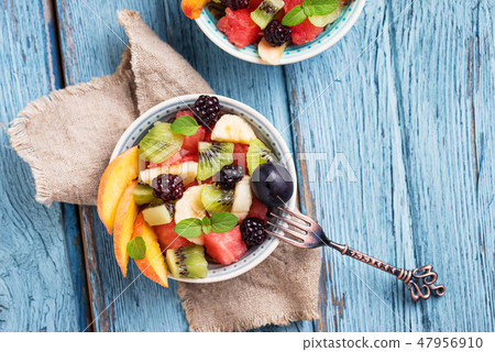 Fruits salad with watermelon, banana and kiwi  47956910