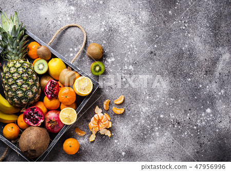Assortment of fresh tropical fruits 47956996