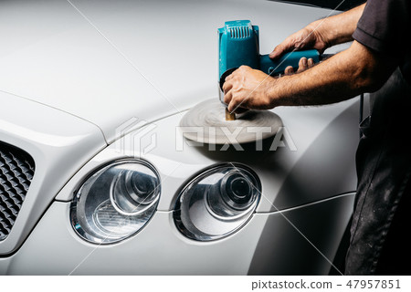 Car detailing series: Polishing white luxury car 47957851