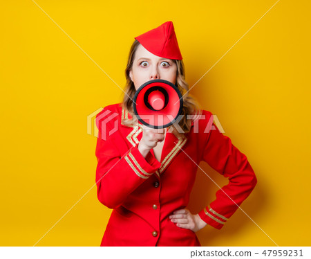 vintage stewardess wearing in red uniform with megaphone vintage stewardess wearing in red uniform with megaphone 47959231